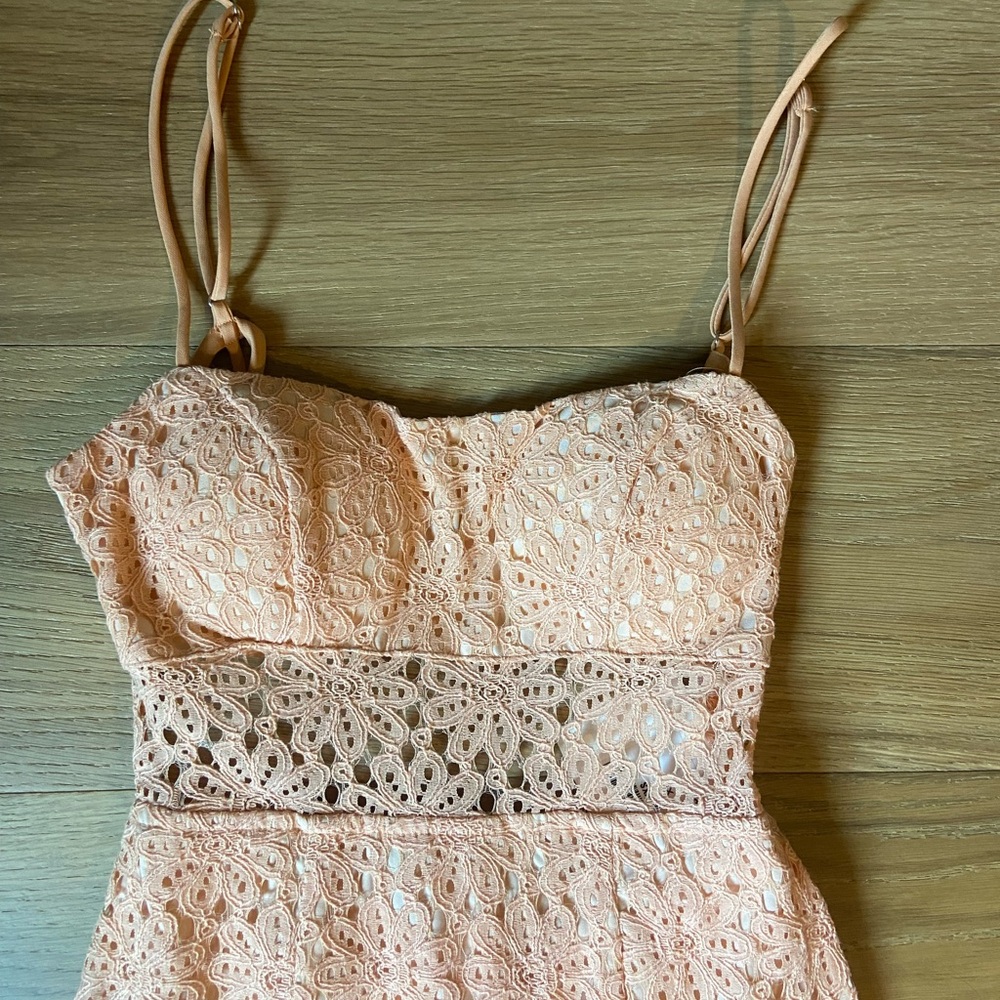 Peach lace midi dress with open back